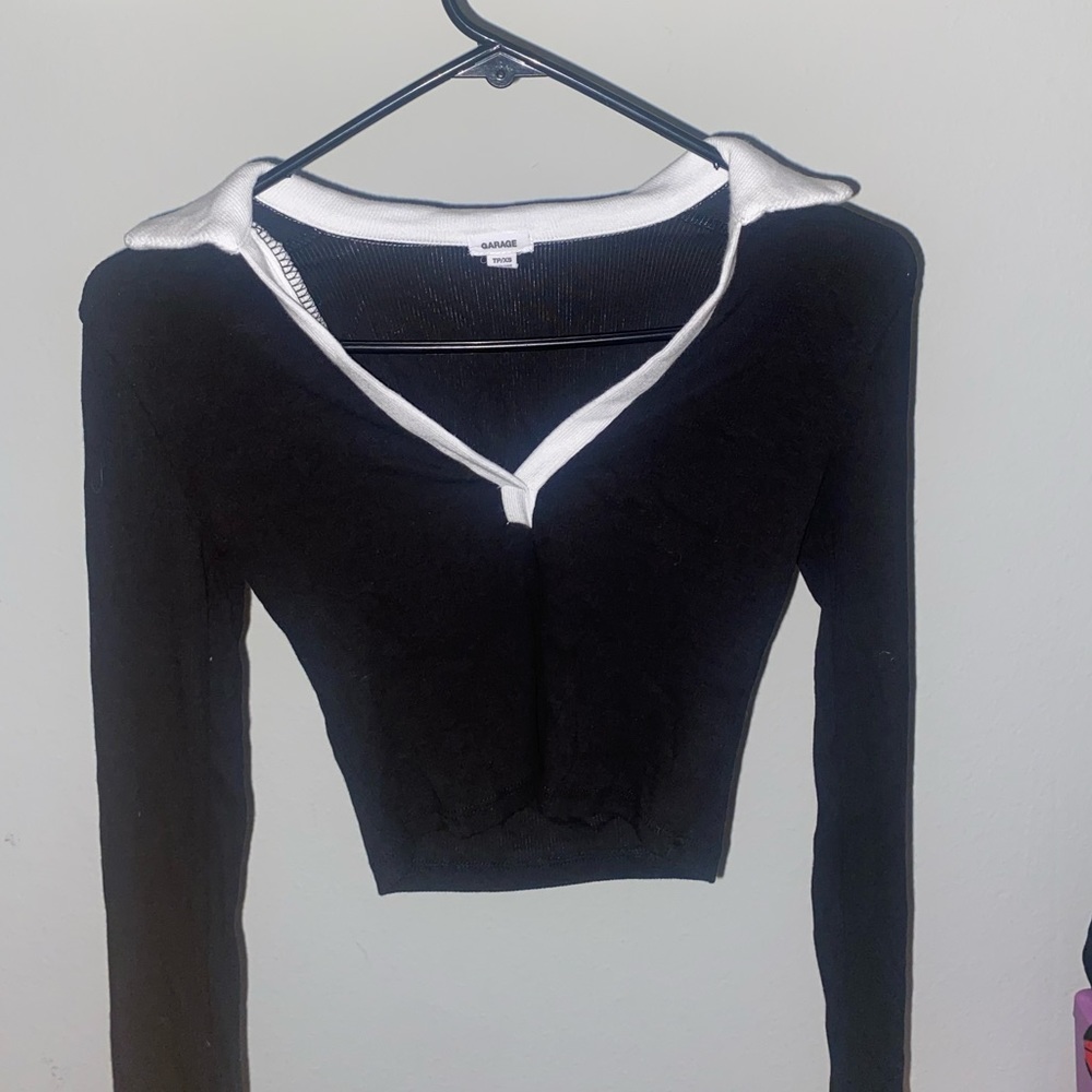 Size XS. Black/White V neck long sleeve from Garage